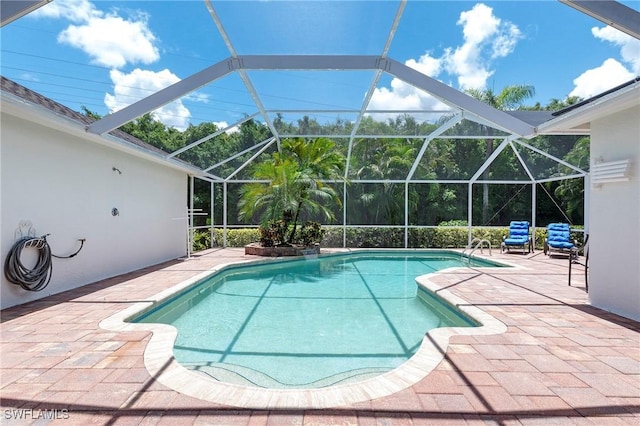 2050 Terrazzo Ln, Naples, FL 34104 - swimming pool featuring a patio