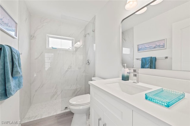 2050 Terrazzo Ln, Naples, FL 34104 - full bath featuring vanity and a marble finish shower