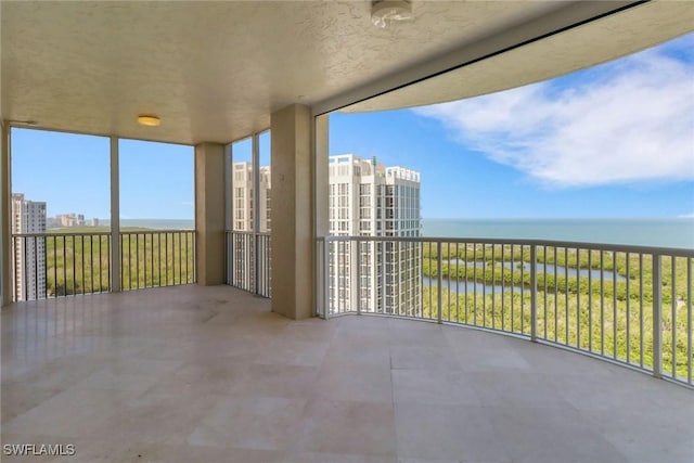 7117 Pelican Bay Blvd Unit 1801, Naples, FL 34108 - balcony with a water view