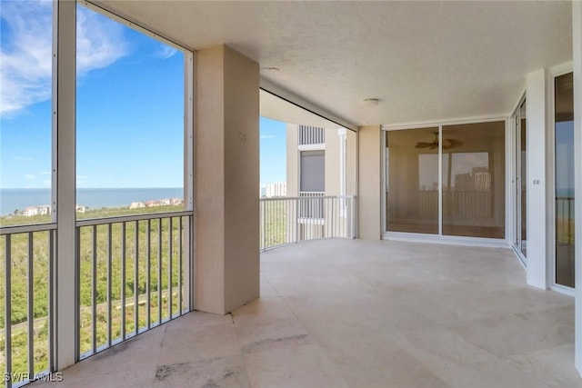 7117 Pelican Bay Blvd Unit 1801, Naples, FL 34108 - balcony featuring a water view