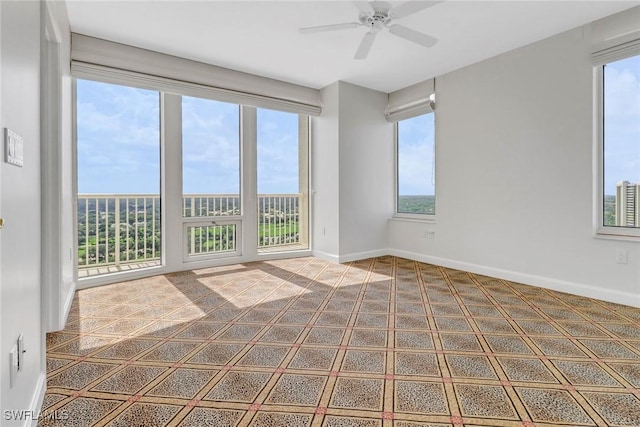 7117 Pelican Bay Blvd Unit 1801, Naples, FL 34108 - carpeted spare room featuring ceiling fan and baseboards