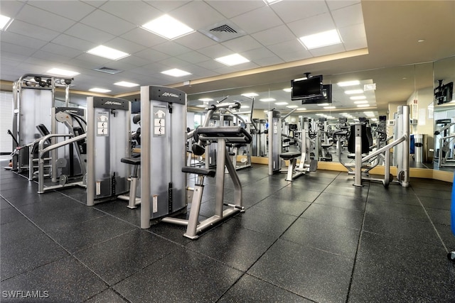 7117 Pelican Bay Blvd Unit 1801, Naples, FL 34108 - exercise room featuring a paneled ceiling