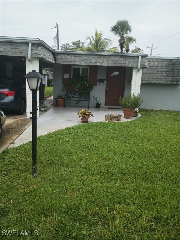 340 Easton Ct, Lehigh Acres, FL 33936 - view of green lawn