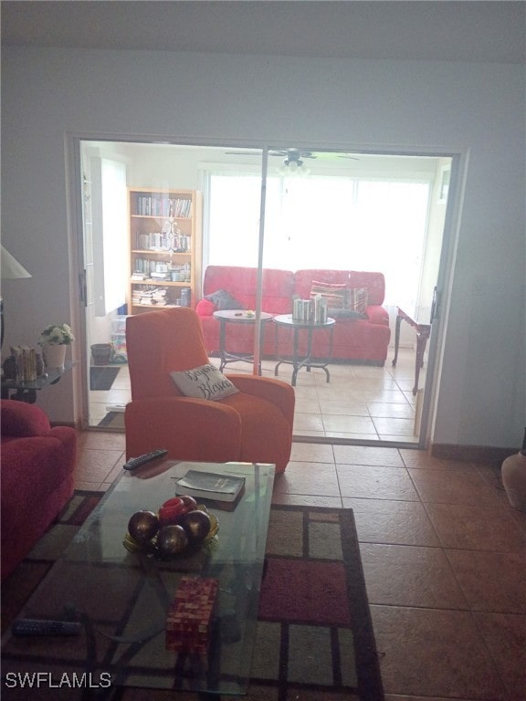 340 Easton Ct, Lehigh Acres, FL 33936 - living area featuring tile patterned flooring and a ceiling fan