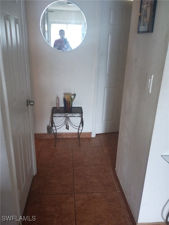 340 Easton Ct, Lehigh Acres, FL 33936 - hall with tile patterned flooring