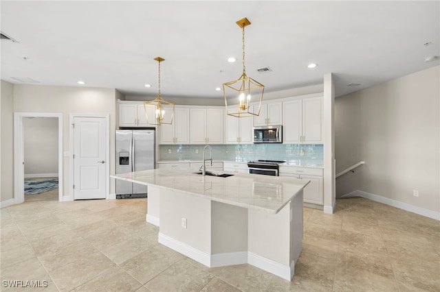 15140 Palmer Lake Cir Unit 201, Naples, FL 34109 - kitchen featuring appliances with stainless steel finishes, tasteful backsplash, white cabinetry, and recessed lighting