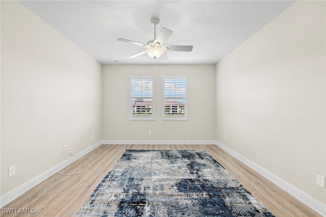 15140 Palmer Lake Cir Unit 201, Naples, FL 34109 - unfurnished room featuring a ceiling fan and light wood-style floors