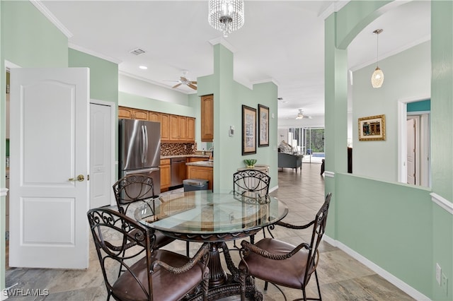 8014 Kilkenny Ct Unit G47, Naples, FL 34112 - dining area with ceiling fan, ornamental molding, and light tile patterned flooring