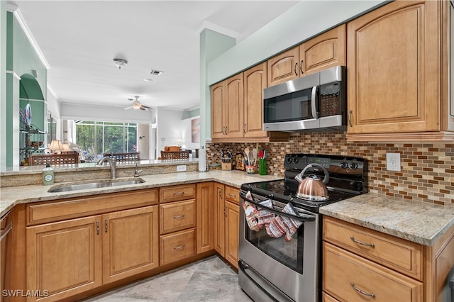 8014 Kilkenny Ct Unit G47, Naples, FL 34112 - kitchen featuring appliances with stainless steel finishes, crown molding, light stone counters, tasteful backsplash, and a ceiling fan