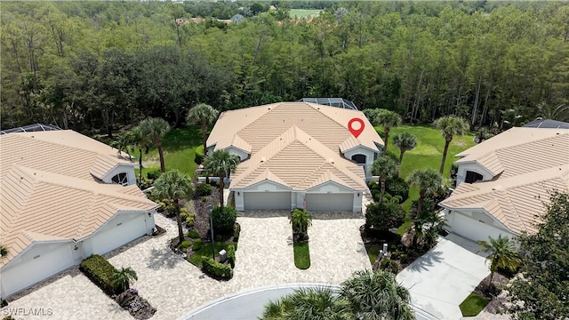 8014 Kilkenny Ct Unit G47, Naples, FL 34112 - view from above of property featuring a heavily wooded area