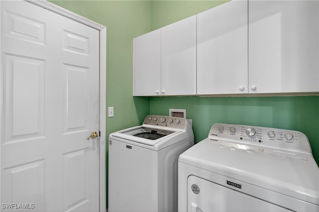 8014 Kilkenny Ct Unit G47, Naples, FL 34112 - laundry room with cabinet space and independent washer and dryer