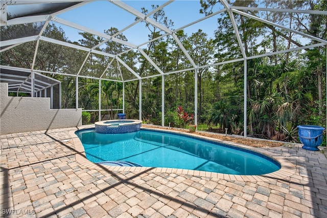 8014 Kilkenny Ct Unit G47, Naples, FL 34112 - view of pool with a patio, a pool with connected hot tub, and glass enclosure
