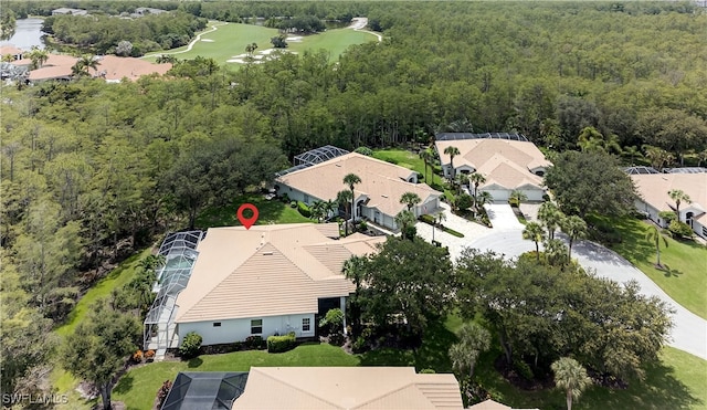 8014 Kilkenny Ct Unit G47, Naples, FL 34112 - aerial perspective of suburban area featuring a heavily wooded area and a golf course