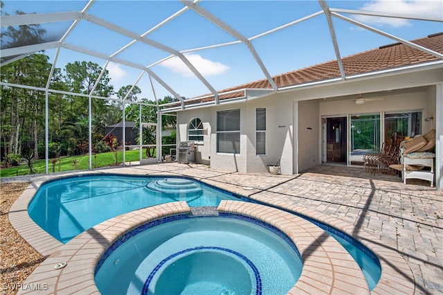 8014 Kilkenny Ct Unit G47, Naples, FL 34112 - view of pool with a pool with connected hot tub, a patio area, and ceiling fan