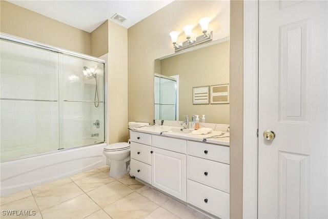 4780 Shinnecock Hills Ct Unit 102, Naples, FL 34112 - full bathroom with vanity and combined bath / shower with glass door