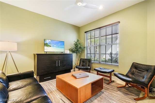 4780 Shinnecock Hills Ct Unit 102, Naples, FL 34112 - living room featuring baseboards and ceiling fan