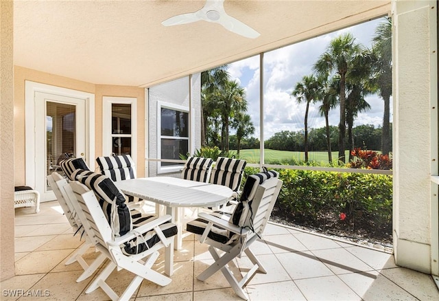 4780 Shinnecock Hills Ct Unit 102, Naples, FL 34112 - sunroom with tile patterned floors and plenty of natural light
