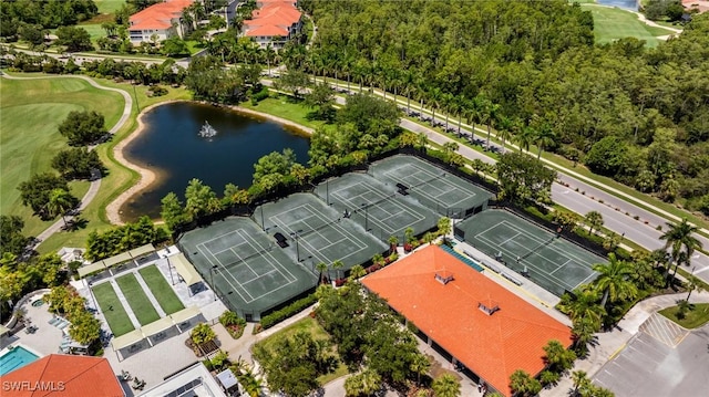4780 Shinnecock Hills Ct Unit 102, Naples, FL 34112 - drone / aerial view of a large body of water and a local golf course