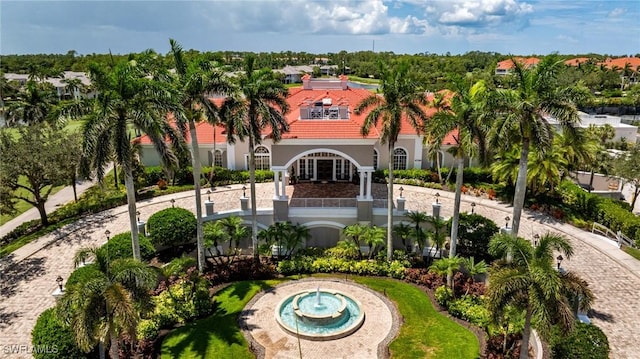 4780 Shinnecock Hills Ct Unit 102, Naples, FL 34112 - view of property featuring curved driveway