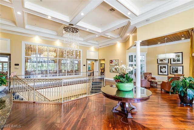 4780 Shinnecock Hills Ct Unit 102, Naples, FL 34112 - interior space featuring ornate columns, a chandelier, beam ceiling, crown molding, and coffered ceiling
