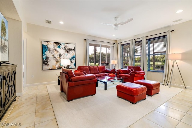 4780 Shinnecock Hills Ct Unit 102, Naples, FL 34112 - living area with light tile patterned floors, a ceiling fan, and recessed lighting