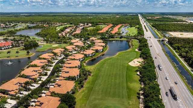 4780 Shinnecock Hills Ct Unit 102, Naples, FL 34112 - aerial view of property and surrounding area with nearby suburban area and a nearby body of water