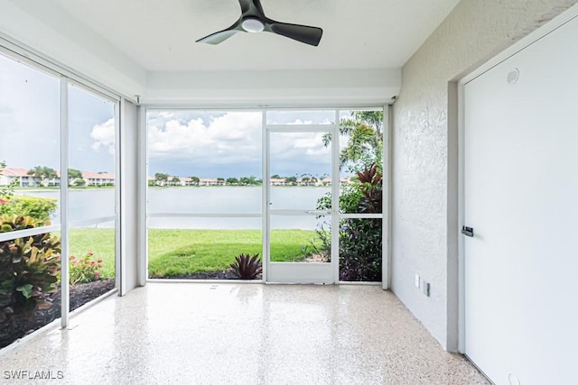 7718 Jewel Ln Unit 101, Naples, FL 34109 - unfurnished sunroom featuring a water view