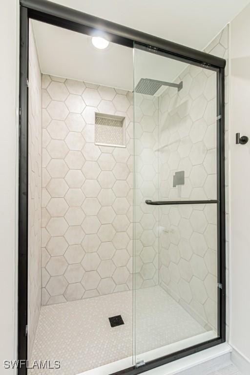 7718 Jewel Ln Unit 101, Naples, FL 34109 - bathroom with a shower stall