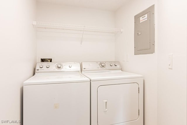 7718 Jewel Ln Unit 101, Naples, FL 34109 - laundry area featuring electric panel and separate washer and dryer