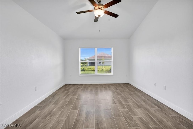 2920 6th St SW, Lehigh Acres, FL 33976 - unfurnished room with wood finished floors, ceiling fan, and vaulted ceiling