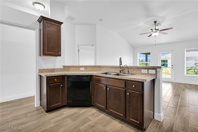 2920 6th St SW, Lehigh Acres, FL 33976 - kitchen with dishwasher, a peninsula, light wood-style flooring, and lofted ceiling