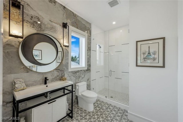 309 Neapolitan Way, Naples, FL 34103 - full bathroom featuring a shower stall, vanity, and tile patterned flooring