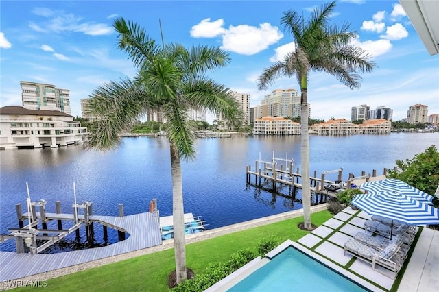309 Neapolitan Way, Naples, FL 34103 - dock with a lawn, a water view, and boat lift