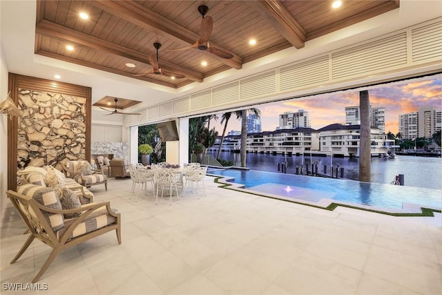 309 Neapolitan Way, Naples, FL 34103 - view of swimming pool with a ceiling fan and a water view