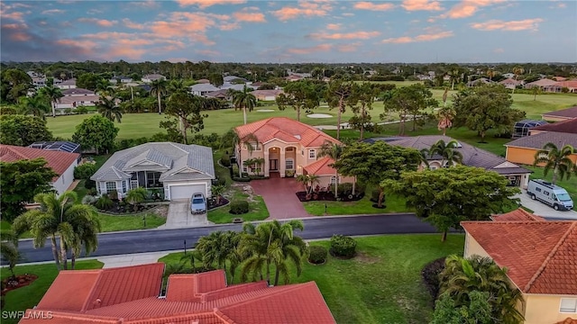 4582 Fairloop Run, Lehigh Acres, FL 33973 - aerial perspective of suburban area with a golf course