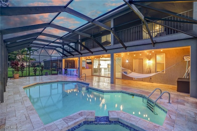 4582 Fairloop Run, Lehigh Acres, FL 33973 - view of swimming pool featuring a patio, a pool with connected hot tub, and glass enclosure