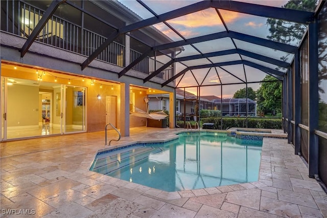 4582 Fairloop Run, Lehigh Acres, FL 33973 - view of pool featuring a patio area, a pool with connected hot tub, and glass enclosure