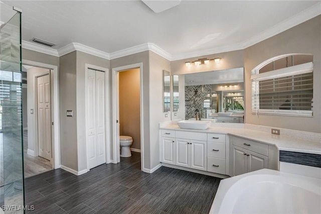 4582 Fairloop Run, Lehigh Acres, FL 33973 - full bathroom featuring vanity, wood finish floors, ornamental molding, a tub, and a shower