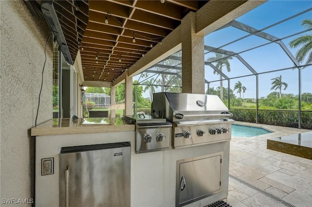 4582 Fairloop Run, Lehigh Acres, FL 33973 - view of patio / terrace featuring an outdoor kitchen, an outdoor pool, and glass enclosure