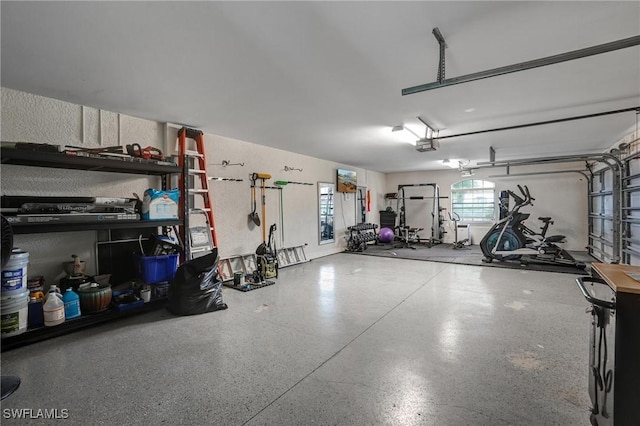 4582 Fairloop Run, Lehigh Acres, FL 33973 - garage featuring a garage door opener