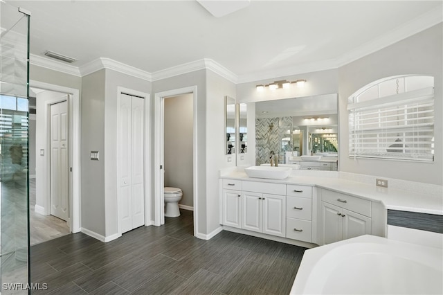 4582 Fairloop Run, Lehigh Acres, FL 33973 - bathroom with vanity, crown molding, wood finish floors, and a tub to relax in