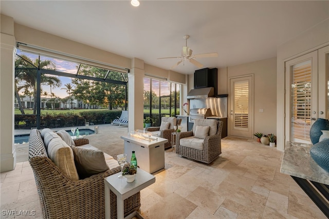 3262 Sedge Pl, Naples, FL 34105 - living area with stone tile flooring and a ceiling fan