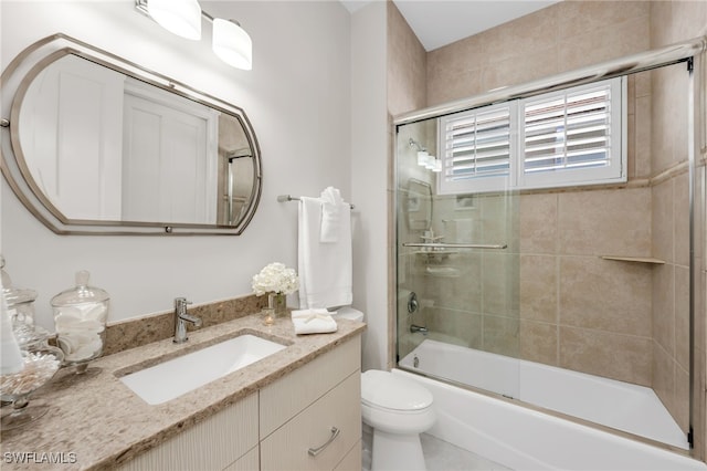 3262 Sedge Pl, Naples, FL 34105 - bathroom featuring vanity and bath / shower combo with glass door