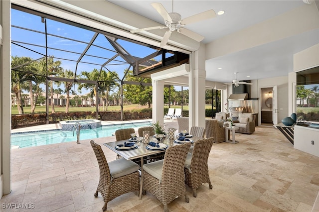 3262 Sedge Pl, Naples, FL 34105 - dining area with stone tile floors, ceiling fan, a sunroom, healthy amount of natural light, and a towering ceiling