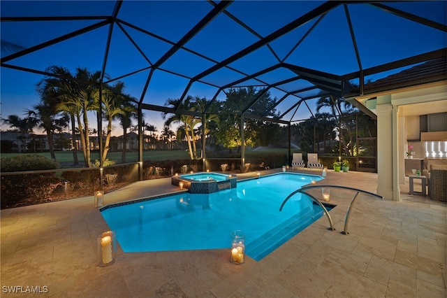3262 Sedge Pl, Naples, FL 34105 - pool at dusk with a patio, a pool with connected hot tub, and glass enclosure