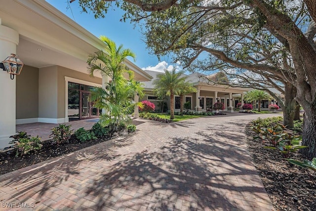 3262 Sedge Pl, Naples, FL 34105 - view of side of home with stucco siding