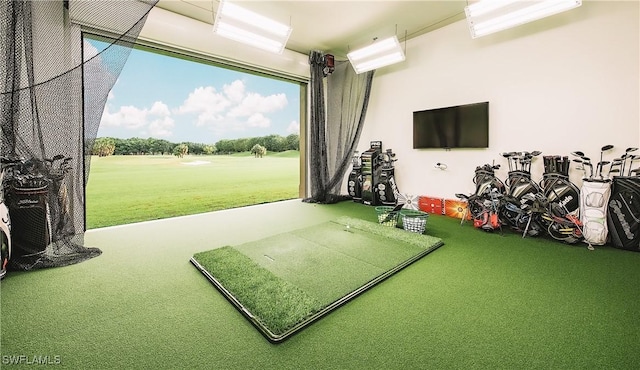3262 Sedge Pl, Naples, FL 34105 - rec room with carpet floors, golf simulator, and a putting area