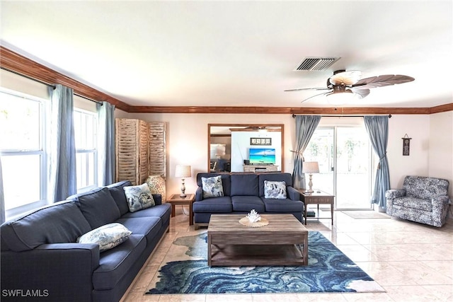 401 NE 14th Pl, Cape Coral, FL 33909 - living area featuring a ceiling fan, crown molding, and healthy amount of natural light