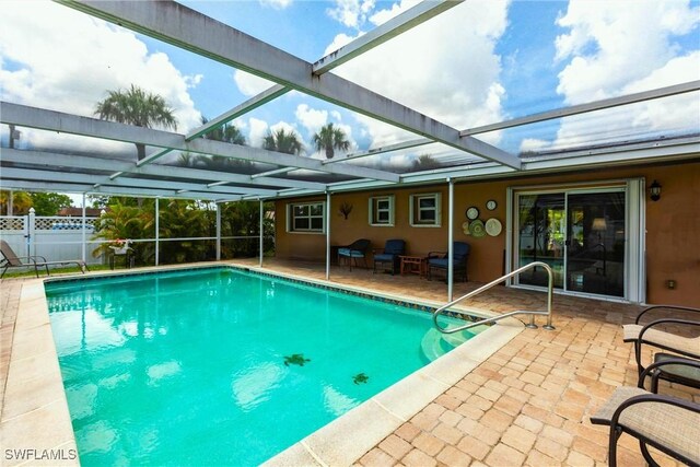 401 NE 14th Pl, Cape Coral, FL 33909 - view of pool featuring a patio and a lanai