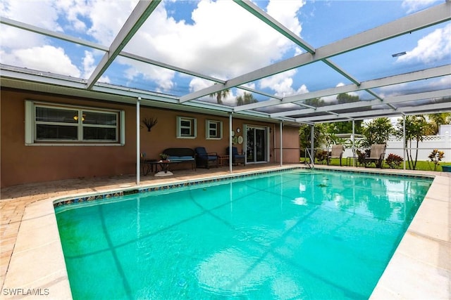 401 NE 14th Pl, Cape Coral, FL 33909 - view of swimming pool with a patio area and glass enclosure